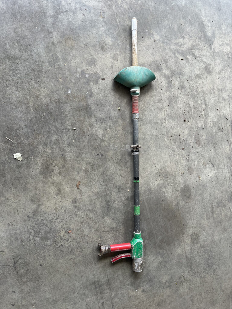 Air spade tool used in root aeration.